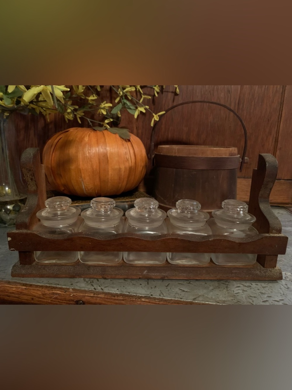 Primitive-style wooden spice rack and glass jars